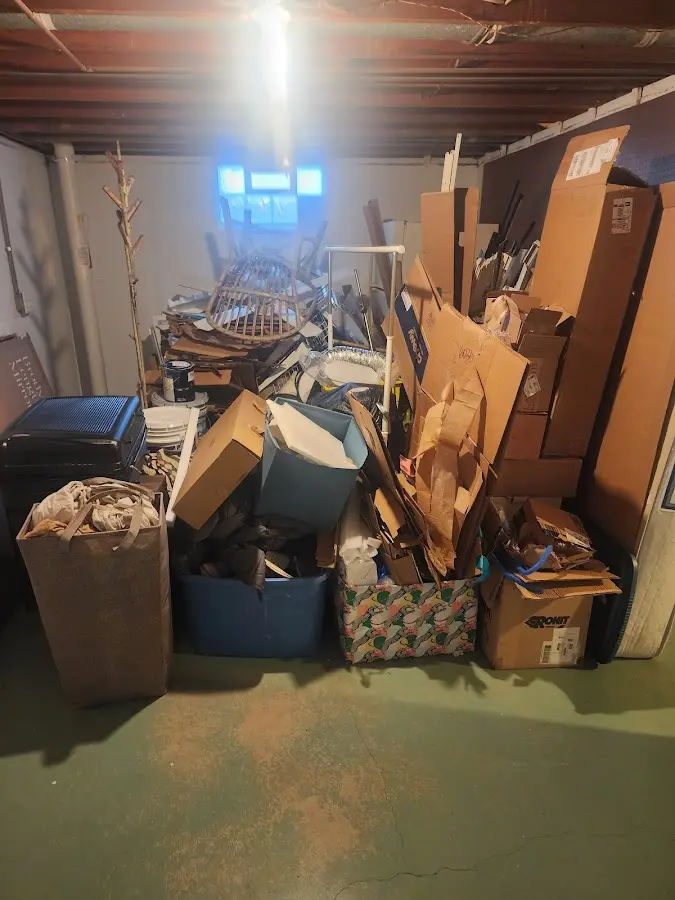 Roll-off dumpster container at job site for Cleanout Dumpster Rental in Cassville